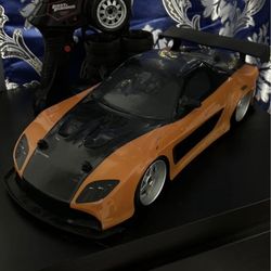 Jada Toys Fast & Furious Han’s Mazda RX-7 Drift RC Car, 1: 10 Scale 2.4Ghz Remote Control Orange & B