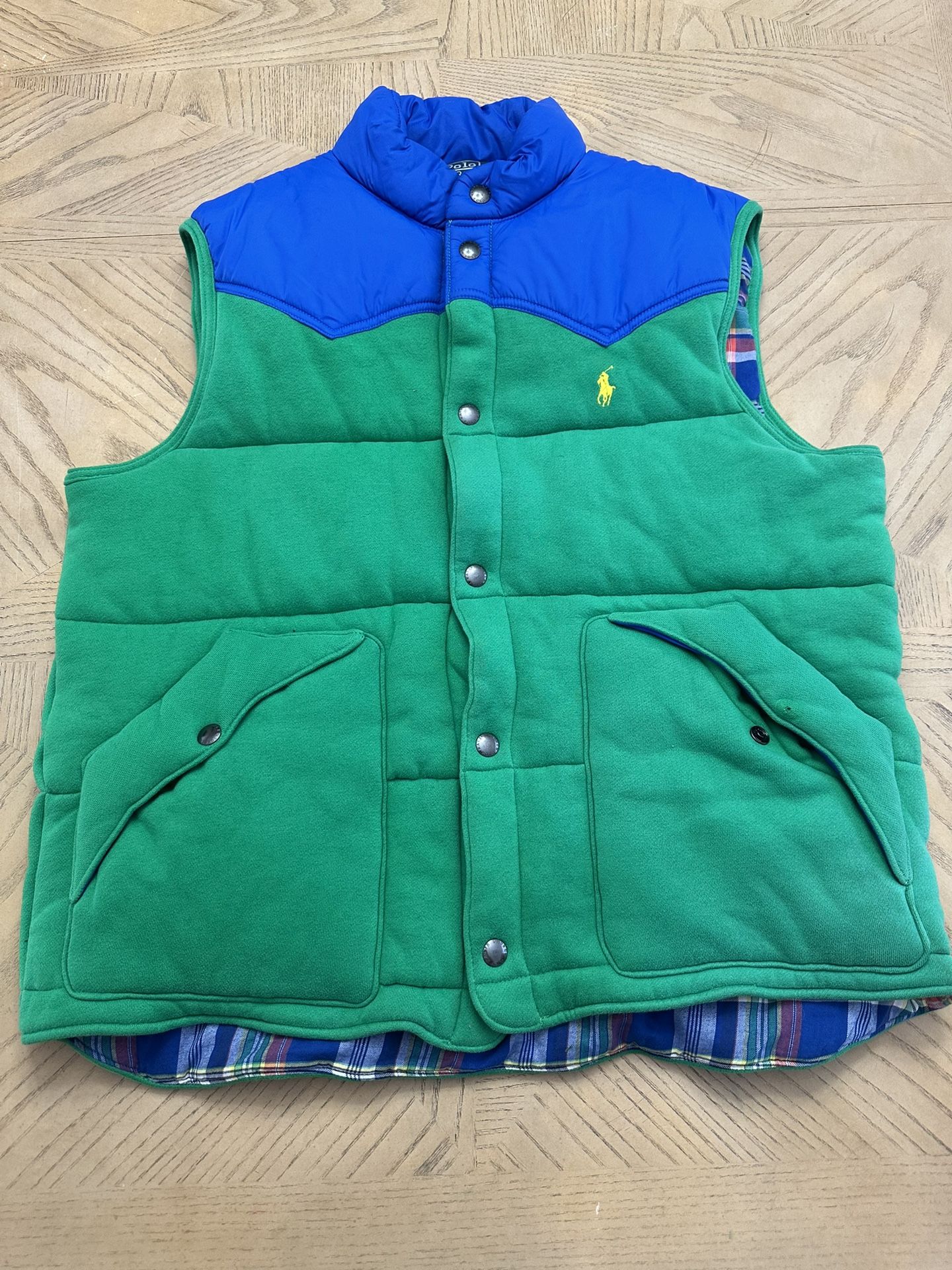 Polo Ralph Lauren Colorblocked Puffer Vest in green and blue, with a plaid flannel lining