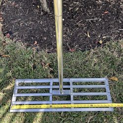 Leveling rake