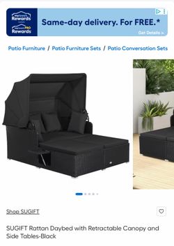 rattan daybed with retractable canopy and side tables-black