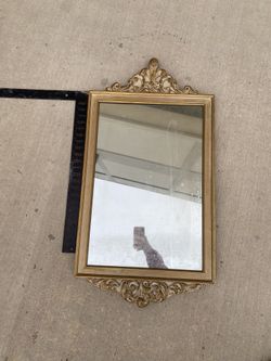 Mirror with gold frame
