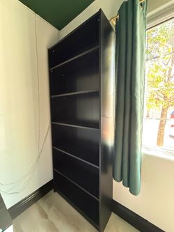bookcase with six shelves worth of storage Large bookcase with six shelves worth of storage