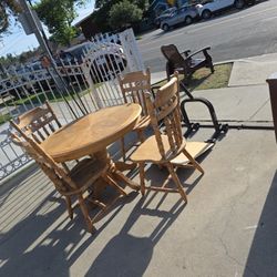Wood table with four chairs