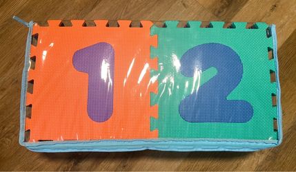 Foam play mat with letters and numbers for children.