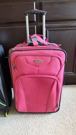 Carry On Suit Cases 1 New / Pink Used Once $20 each