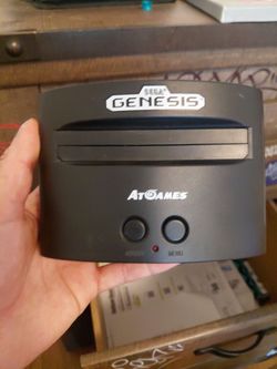 Sega genesis mini video game console and 2 controllers used  no wires included  works fine