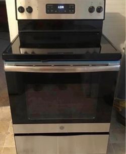 GE stainless steel stove and oven / delivery