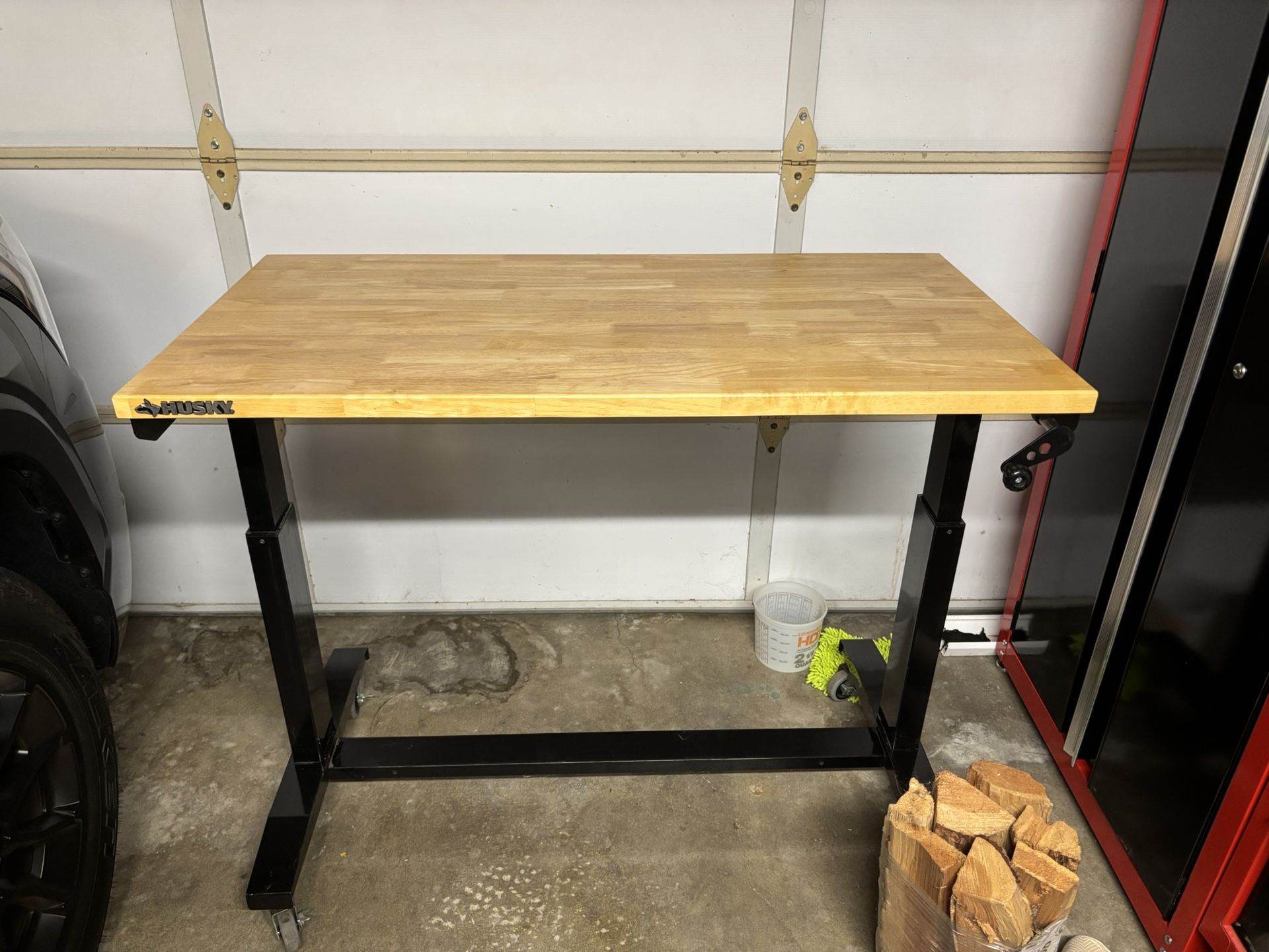 Husky 46 in. W x 24 in. D Adjustable Height Black Workbench Table with Solid Wood Top