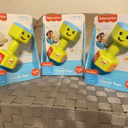 Fisher-Price Laugh & Learn Countin' Reps Dumbbell Baby Rattle Toy with Lights Music & Learning Songs