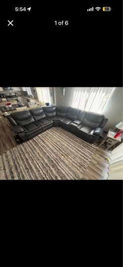 Grey recliner sectional.