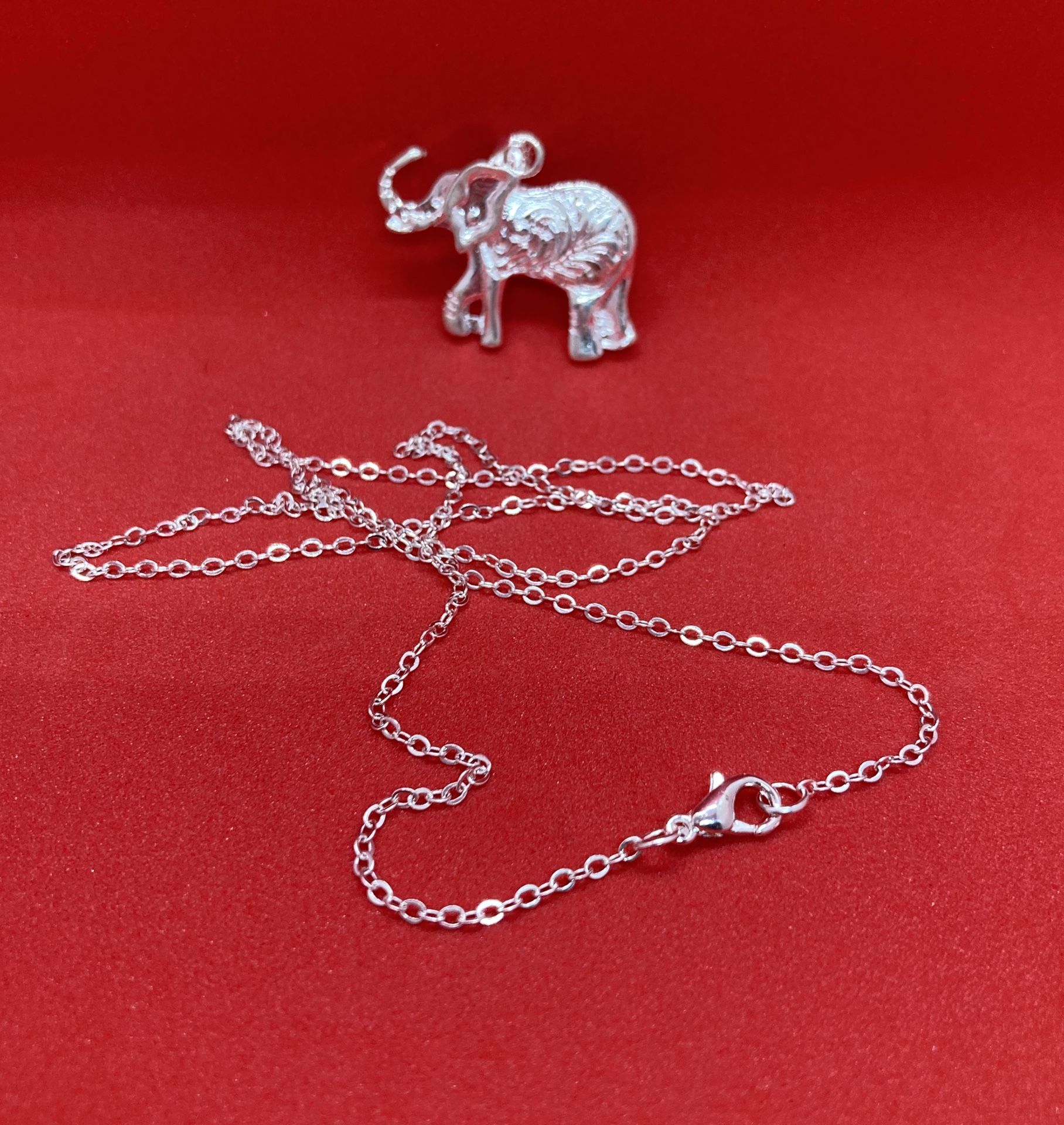 Elephant charm and necklace