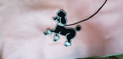 pink poodle skirt with black poodle