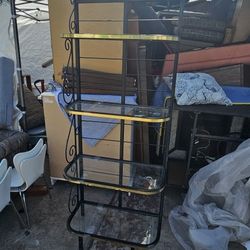 Vintage Black Wrought Iron Bakers Rack With Gold Trim Accents and Glass Shelves