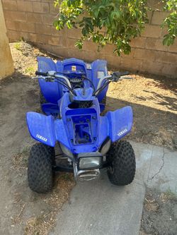 By four wheel quad