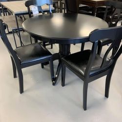 Brand New 5 piece black dining table!