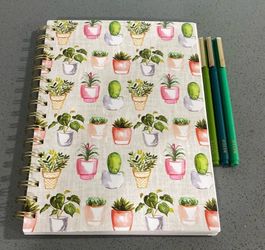 Notebook with pens