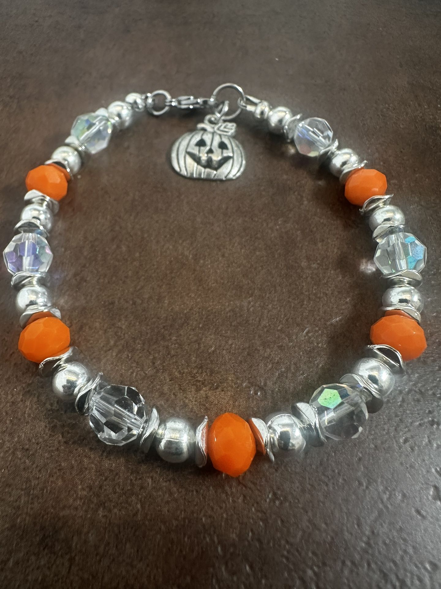 Vibrant Orange and Silver Beaded Bracelet with Pumpkin Charm
