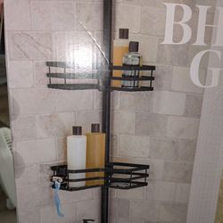 New still in box Black Better Homes and garden tension pole shower caddy adjustable from 5 to 9 ft
