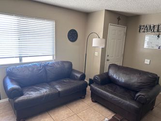 Ashley Furniture brown leather loverseat sofa and chair