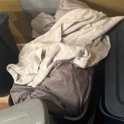 Assortment of blankets and bed covers