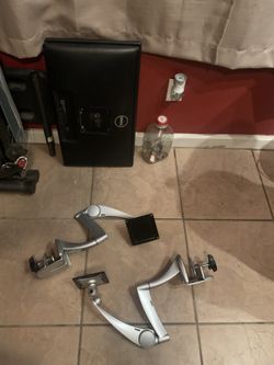 Two Dell 24 inch monitors with two Separete arms 