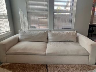 Cream “Utopia” sofa from Living Spaces