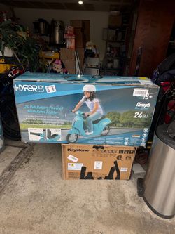 Hyper 24 volt battery powered youth retro scooter new and the box