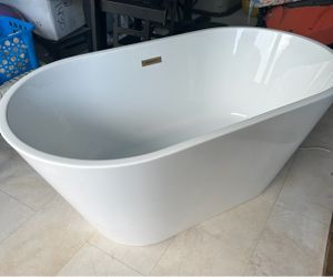 New White Freestanding Bathtub 55" x 30". Center drain. Home Depot $1079 + tax. Pick Up in Jupiter.