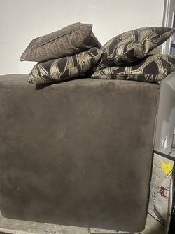 Brown ottoman & Cushions