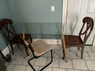 Glass Dining room table set only the two wooden chairs