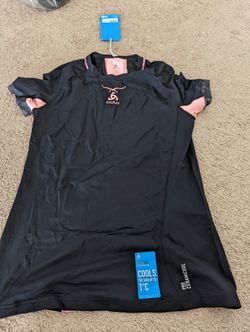 Brand new, tags on Odlo ceramicool performance Tshirt in women's medium 