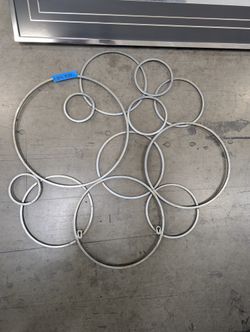Abstract Silver Metal Interlocking Ring Wall Art