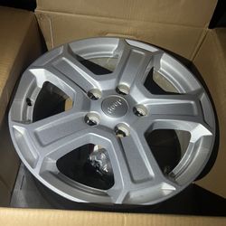 Jeep Wrangler stock 17 inch OEM wheels in excellent condition