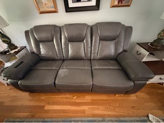 Ashley reclining sofa and love seat.