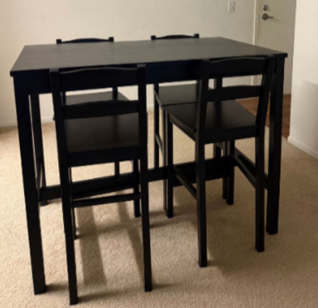 Dining Table And Four Chairs