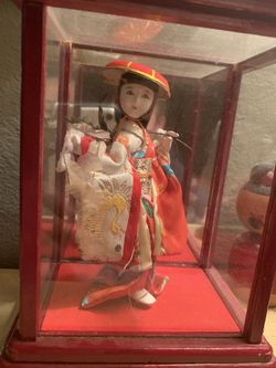 Vintage doll in case