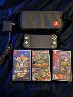 Nintendo Switch lite with games and carrying case
