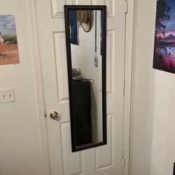 Mirror with door hangers