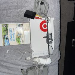 Nintendo Wii Comes With 2 Games And 2 Controllers 