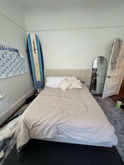 Queen Tempurpedic mattress and frame