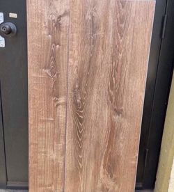 Lifeproof Burnt Oak 22 MIL x 8.7 in. W x 18 in 1. L Click Lock Waterproo Luxury Vinyl Plank Flooring (20.06 sqft/case)