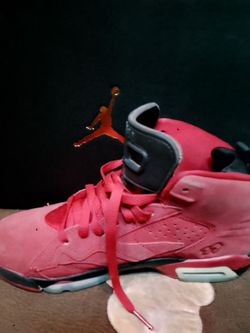 Red Jordans size 7 in women's.