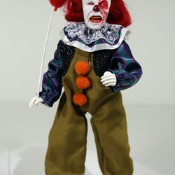 MEGO Horror IT Pennywise Burn Damage Action Figure

