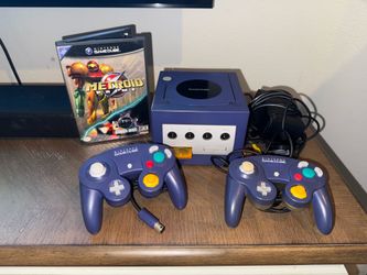 Nintendo GameCube bundle, including 2 original controllers, and Metroid prime bonus disc. Price firm