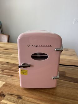 Pink Frigidaire beauty/soda fridge