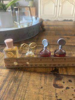 4 vintage miniature perfume bottles