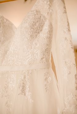 Floral Lace Long Sleeve Wedding Gown with Added Bustle