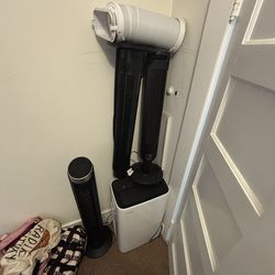 Three stand up fans and a portable AC all working and cooling!
