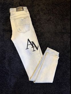 Amiri Light Wash Denim Jeans with AM Logo