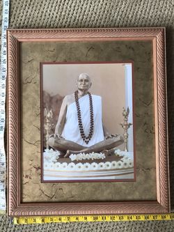 Frame with photo of god/ gurus